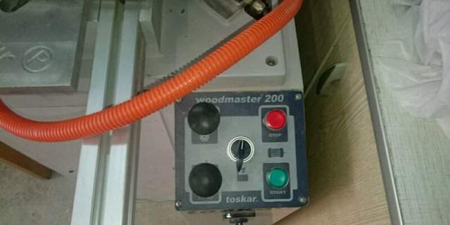 Двухсторонний усозарезной станок Woodmaster-200 (D